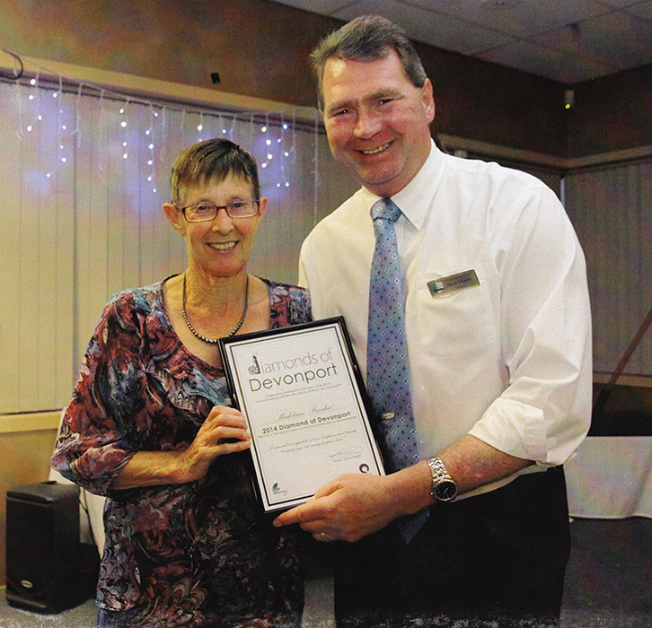 Madeleine Brooker receiving her Diamond of Devonport certificate from Devonport Mayor, Steve Martin